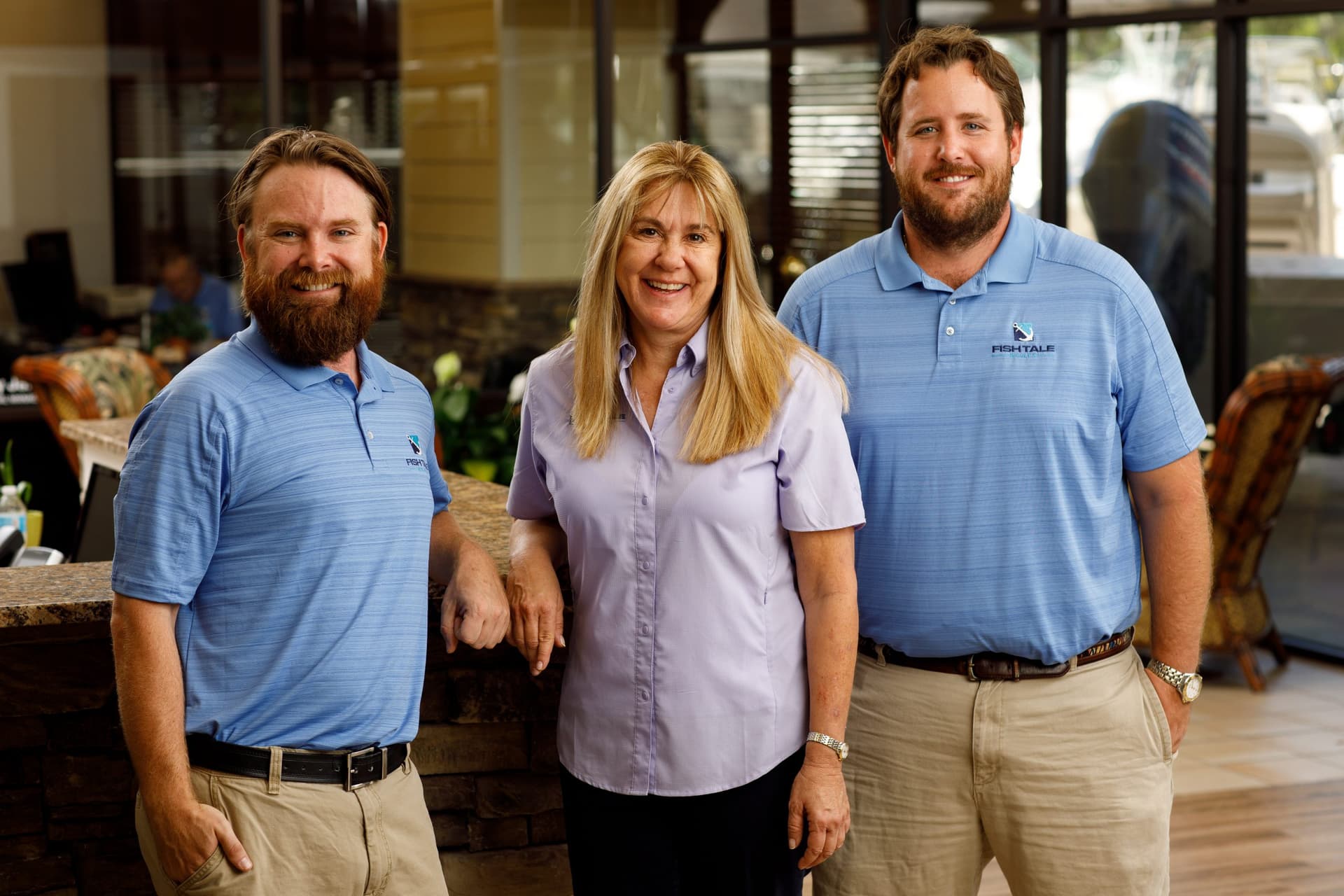 The Fricke family at Fish Tale Boats dealership in Fort Myers