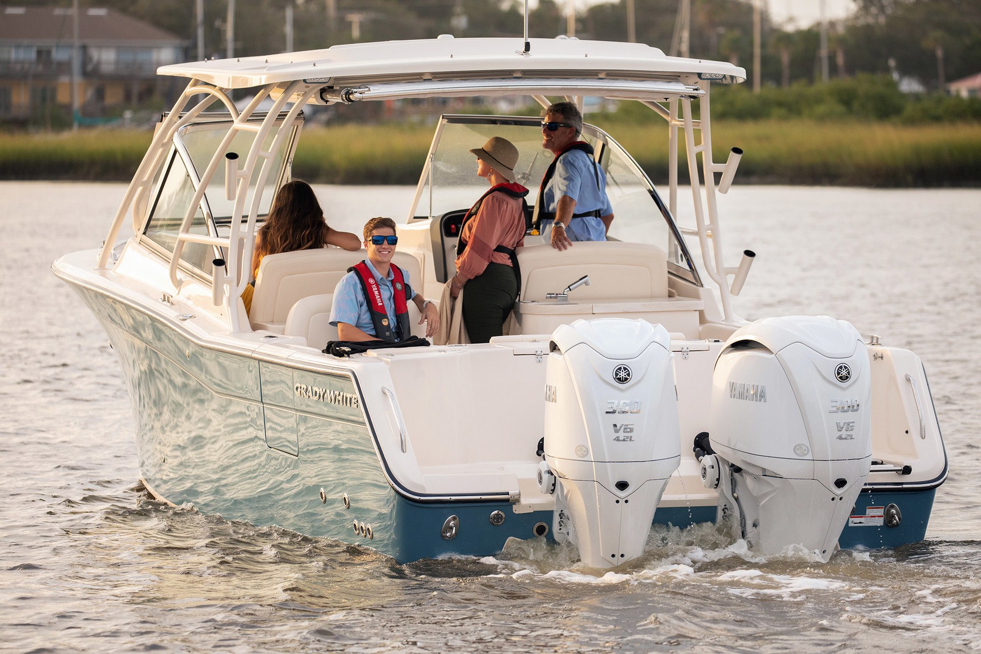 A family on a Grady White powered by Yamaha 300hp V6 outboards