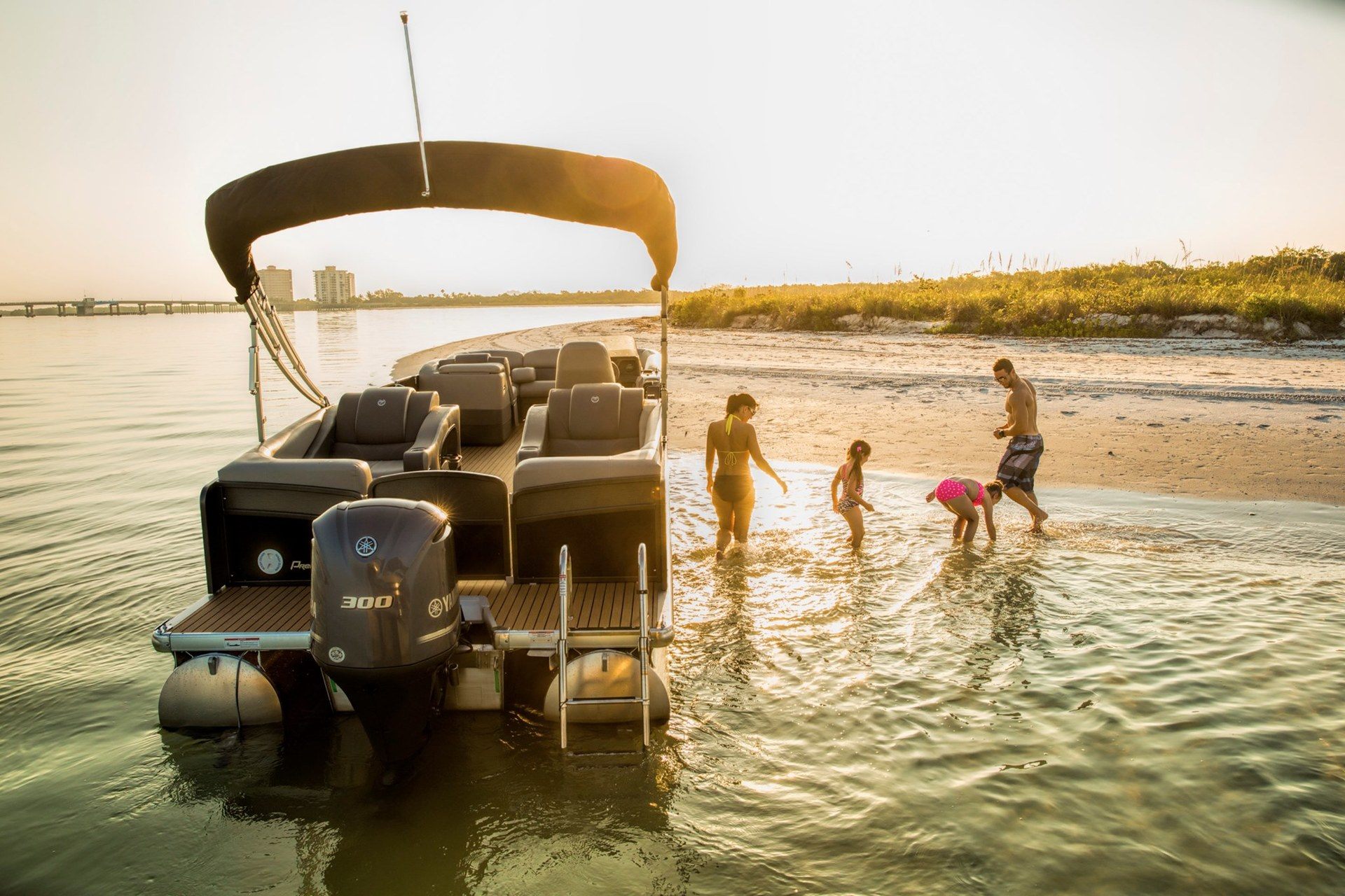 Image Fun Accessories for Your Pontoon Boat a family of four by a Premier Pontoon Escalade boat